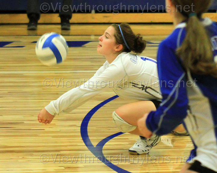 Carlton libero Myranda Papesh digs a ball vs. Hermantown on Monday night.