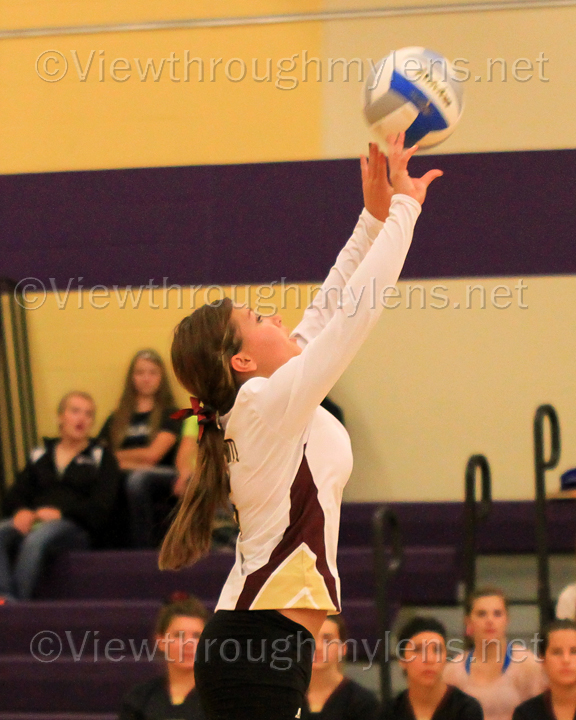 Barnum libero Sage Miletich sets a ball in Cloquet Thursday