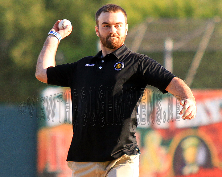 Bulldog Captain and Hobey Baker Winner Jack Connolly throws out the first pitch Thursday for the Duluth Huskies