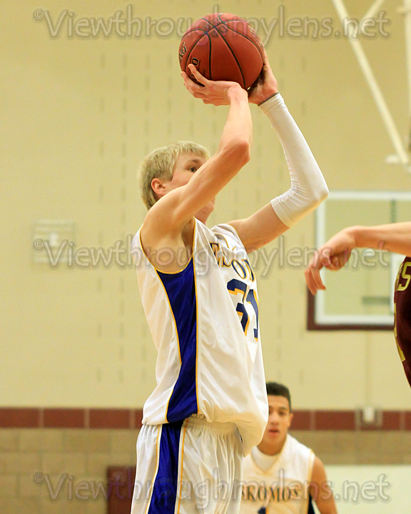 Esko junior Kory Deadrick puts up a 3-pointer vs. Duluth Denfeld