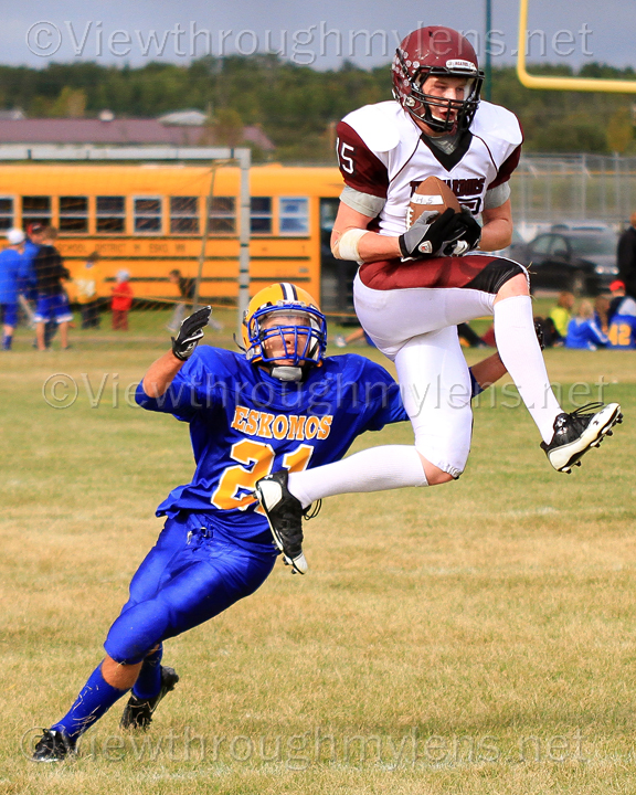 Two Harbors’ Skylar Lysaker makes a leaping catch in Esko