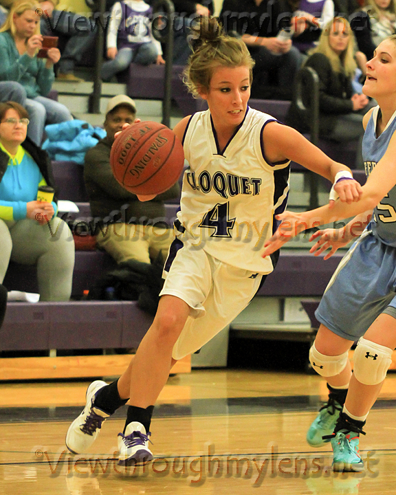 Gracie Sinisalo drives the baseline for Cloquet vs. Bloomington Jefferson