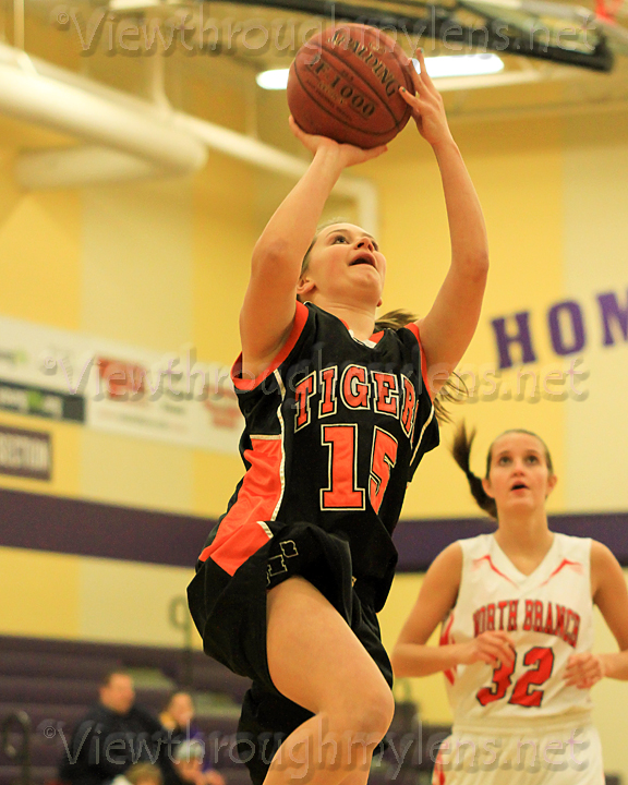 Browerville’s Katelyn Middendorf goes up vs. North Branch on Thursday.