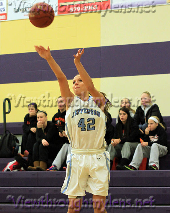 Bloomington Jefferson’s Brooke Fritzlar fires up a three from the corner on Friday.