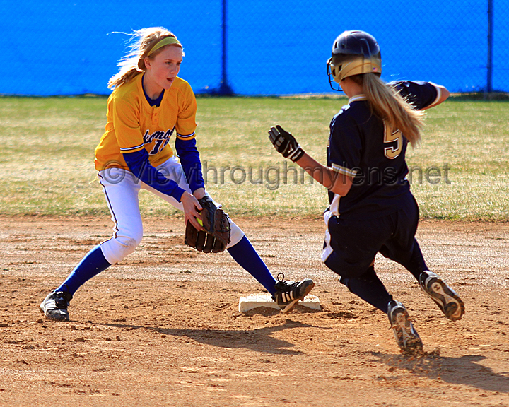 Esko Shortstop Ashley Bergerson tags out Hermantown's Celine Francisco at second base