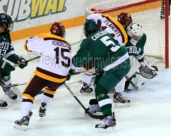 Keegan Flaherty buries a puck in tight.