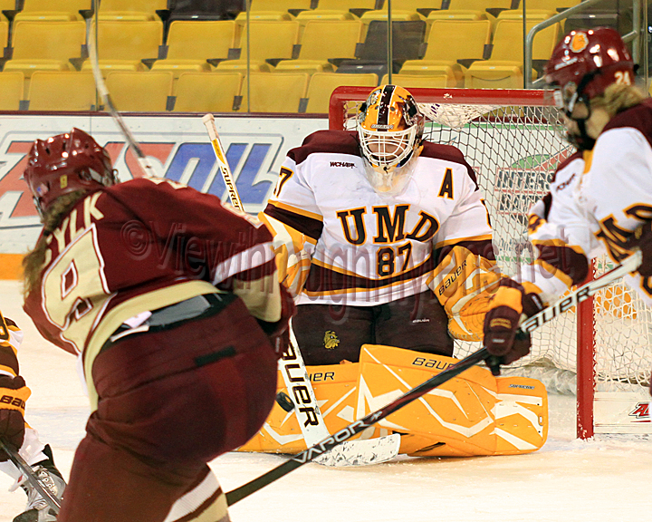 Jenny Harss makes one of her 33 saves vs Boston College Saturday