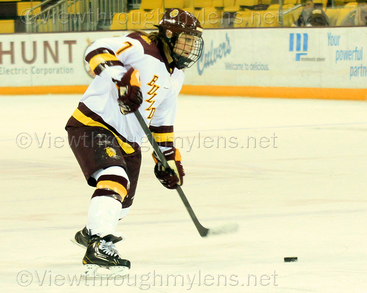 Defenseman Emma Stauber shoots from the point