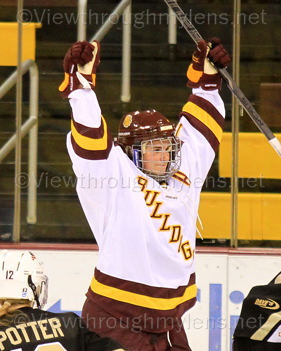 Cournoyer celebrates her first goal of the game